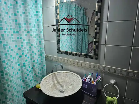 Chacra 1,7 has, con mejoras, zona Cuartel 8. Apta. Crédito 