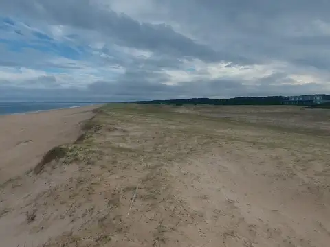 gran terreno primera linea al mar de san antonio