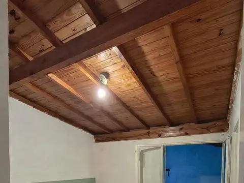 UN DORMITORIO CON PATIO - SIN EXPENSAS 