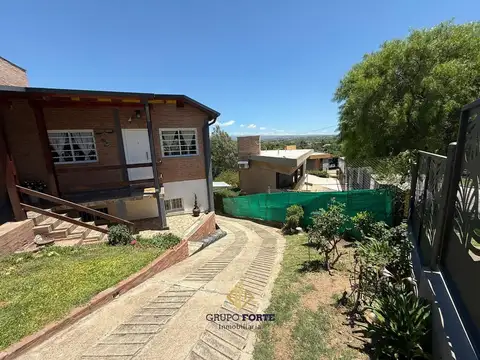 CASA EN VENTA CON DEPARTAMENTO EN BARRIO BECCIU, CARLOS PAZ 