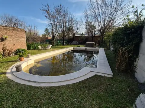 Casa en Funes con quincho y pileta , oportunidad
