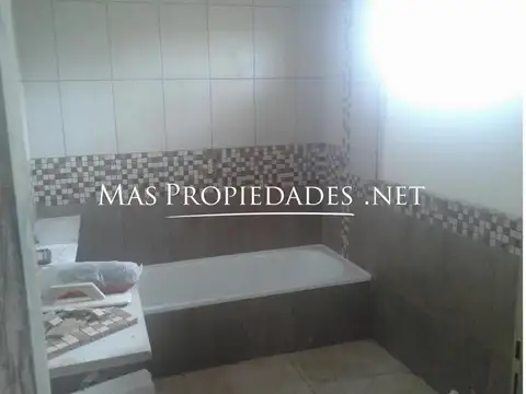 Casa 4 ambientes con 2 baños