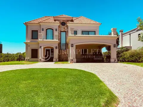 Casa en venta en Pilara sobre laguna y golf en La Calesa - URDAPILLETA PROPIEADES