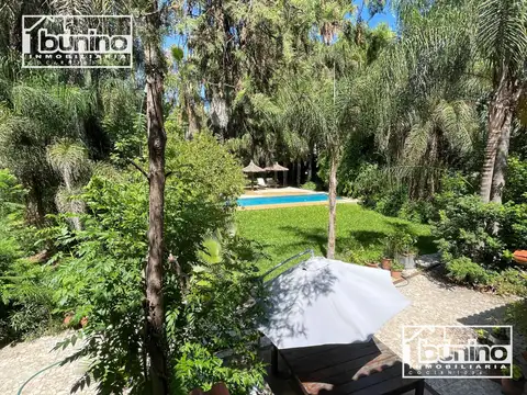 Casa EN VENTA en Roldan - 4 Dormitorios, Pileta y Cochera