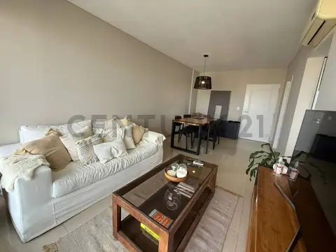 VENTA DEPARTAMENTO DE 2 AMBIENTES CON COCHERA FRENTE AL PARQUE CENTENARIO