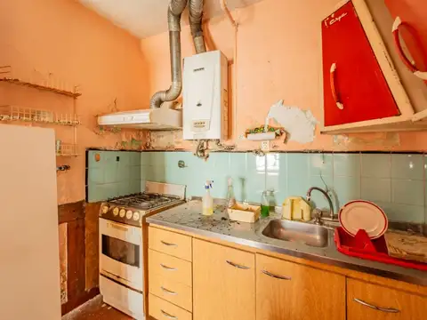 Casa en lote propio a refaccionar