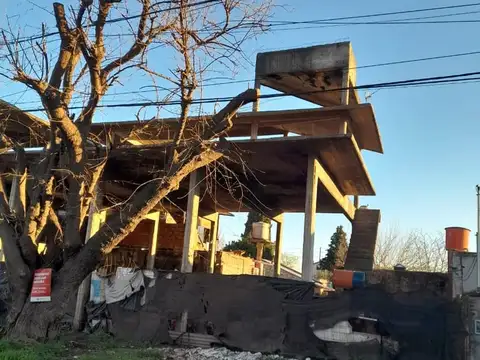 San Martin y Carlos Pellegrini 100