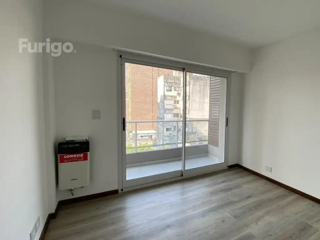 CÓDIGO XVIII | Av. Pellegrini 2632 de 1 Dormitorios