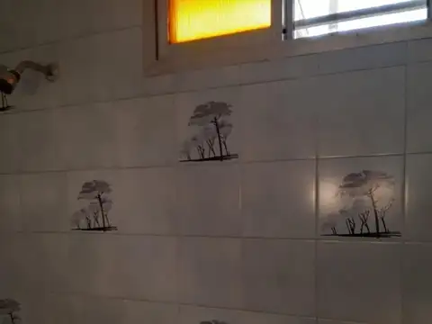 TIPO CASA AL FRENTE 2 DORMITORIOS CON PATIO