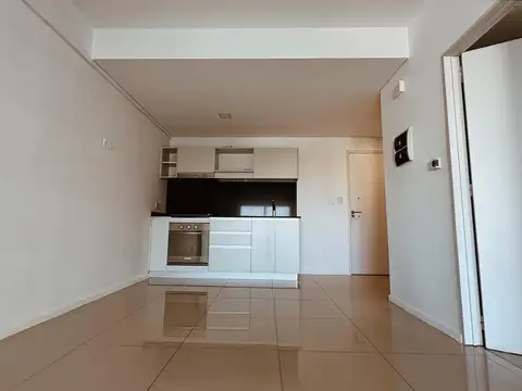 2 Ambientes - Cochera. Piso Alto. Muy Luminoso