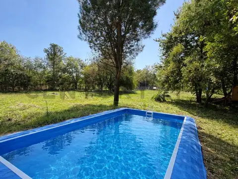 ¡TERRENO CON PILETA EN BARRIO 20 DE JUNIO CON 2 CASAS EN TERMINACIÓN!