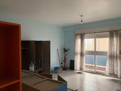 1 AMBIENTE CON BALCON Y COCHERA PROPIA 