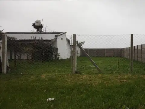 TERRENO EN ANDINO CON MEJORAS