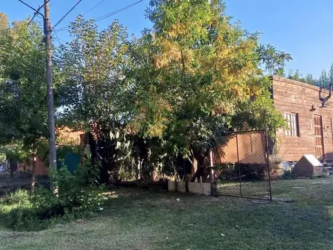 Casa estilo cabaña, construida en sistema woodframe.