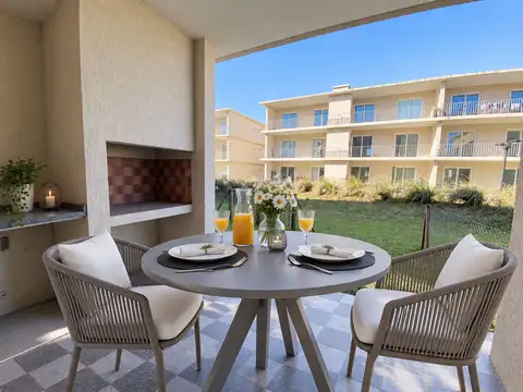 Venta Depto 1 amb. PB c/jardín, parrilla y cochera