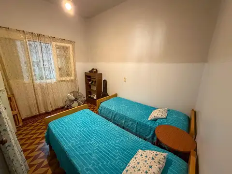 Propiedad de amplio terreno con local comercial + vivienda de 2 habitaciones