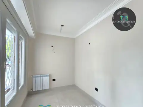 CHALET DE 4 AMB. - CON COCHERA - RECICLADO - B° SAN JOSE