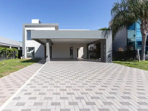 VENTA CASA A ESTRENAR 3 DORMITORIOS BARRIO CERRADO CAMPOS DE ESTHER 650 M2