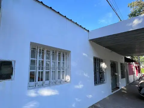 Casa + Salón Comercial + Departamento
