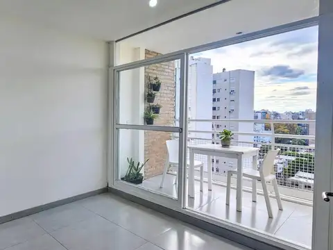Departamento de dos dormitorios con cochera en la sexta
