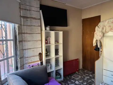 Venta de vivienda con local.