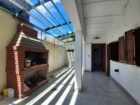 Casa de Pasillo único con 2 dormitorios y patio