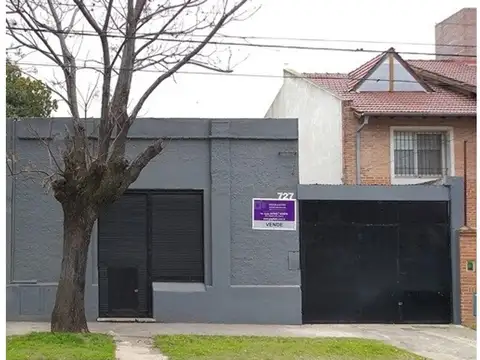 Casa  con 2 dormitorios, garaje con fosa + local comercial 