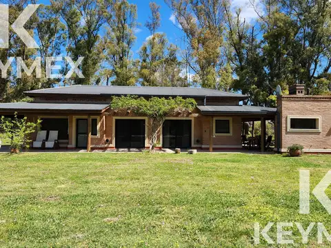 VENTA DE CASA DE 4 DORMITORIOS EN CAMPOS DE ROCA