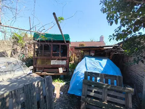 Oportunidad Lote con una construcción .