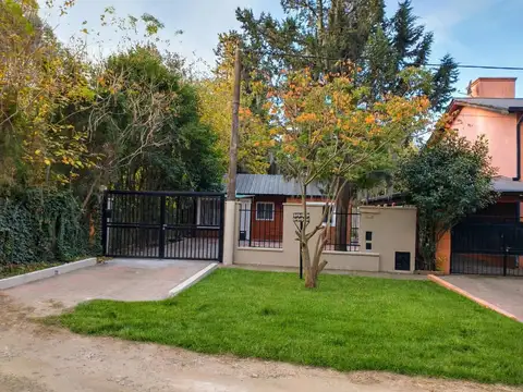 VENTA DE CASA DE DOS DORMITORIOS EN FUNES CENTRO