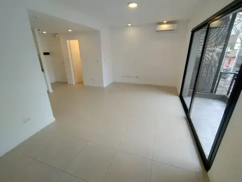DEPARTAMENTO DOS AMBIENTES CON COCHERA Y BAULERA