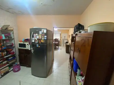 VENTA DE CASA 3 AMBIENTES CON JARDIN COCHERA PARRILLA Y LOTE PROPIO BELLA VISTA A METROS DE AV GASPA