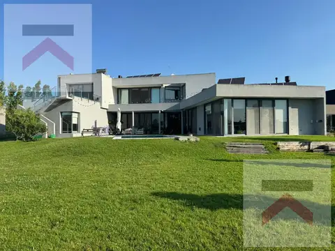 Hermosa Casa en LOTE PREMIUM de 1750m2 AL AGUA en Chacras de la Reserva Cardales