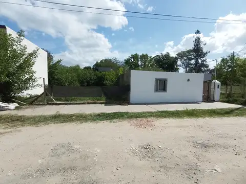 5 Departamentos + un lote baldio