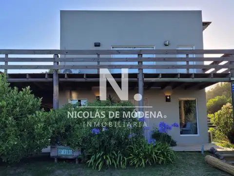 Alquila casa de 4 dormitorios en Manantiales, con parrillero