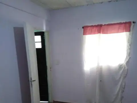 VENTA DE LOTE CON MEJORAS