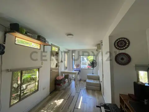 Lote con casa Container en Los Hornos