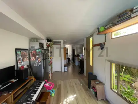 Lote con casa Container en Los Hornos