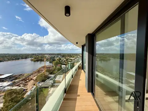 Apartamento en venta de 2 dormitorios y escritorio, 2 baños y garaje.