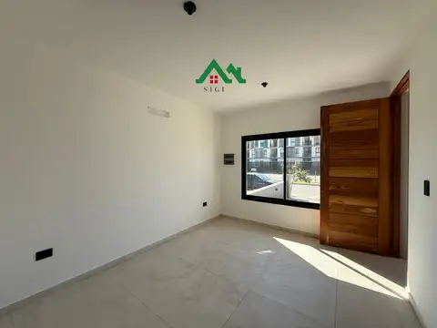 Casa moderna de 2 dormitorios en Docta con patio y seguridad