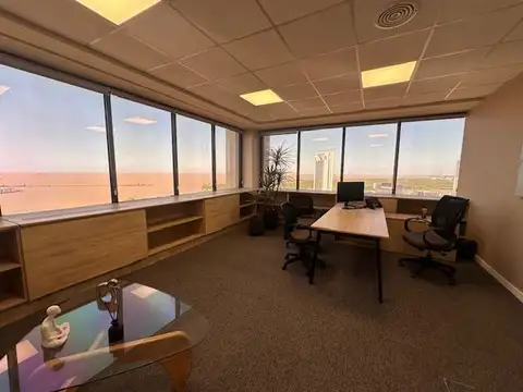 Oficina única totalmete equipada y amoblada con vista panorámica al río.