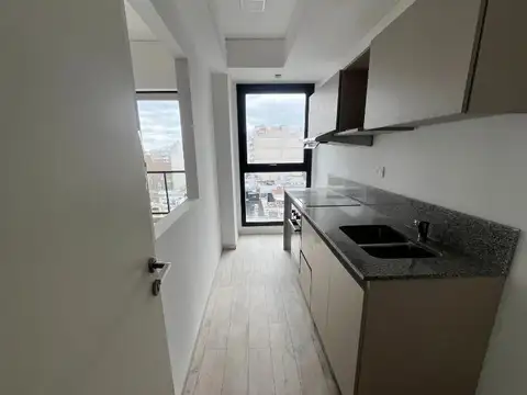 Excelente 3 Ambientes con cochera. Edificio Full Amenities.