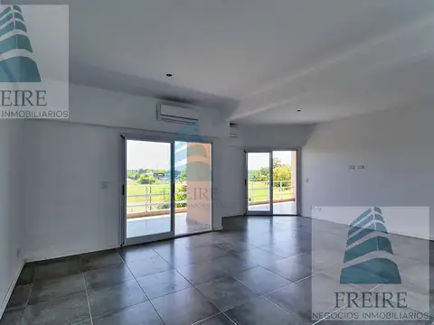 Venta departamento dos ambientes, balcón con parrilla | Condominio El Reparo, km 51 Pilar
