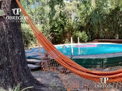 Venta de lote de 668 m2 + Piscina tipo Tanque australiano + Vivienda 