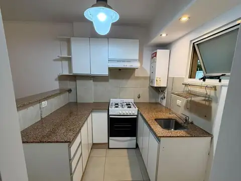 Departamento un dormitorio con cochera en alquiler