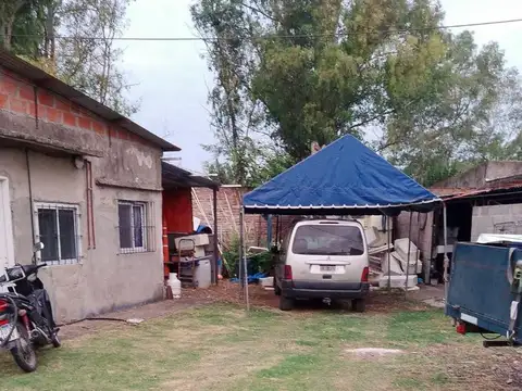 Vivienda con amplio terreno múltiples usos