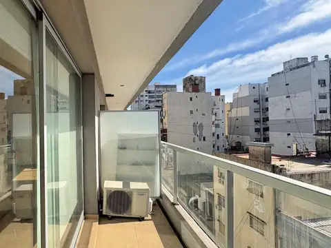 Monoambiente-balcón-amenities-Balvanera-APTO PROF.