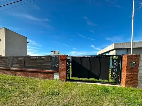 TERRENO CON CONSTRUCCION TIPO QUINCHO
