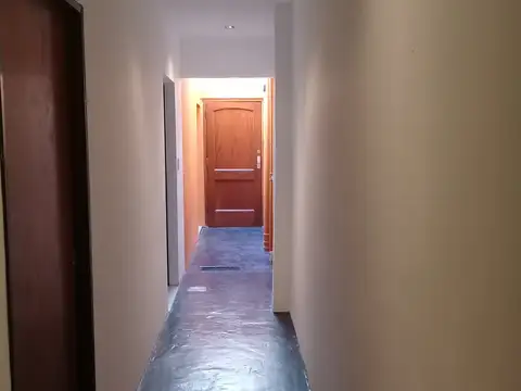 AMPLIO TIPO CASA  PLANTA BAJA DIVISIBLE CON PATIO . SIN EXPENSAS