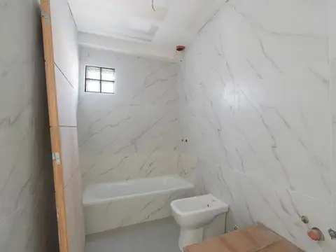 Depto Tipo Casa 4 ambientes con 2 baños